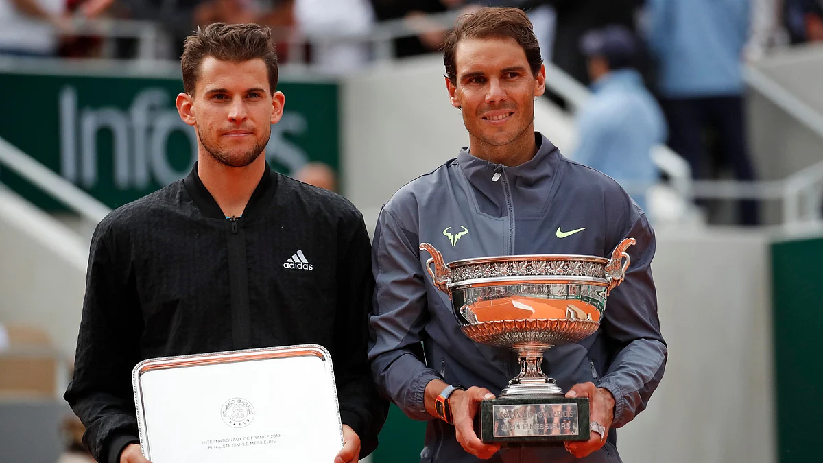 Thiem (left), who had beaten his opponent four times on clay in his career, failed to claim a single point off Nadal’s first five service games of the second set.