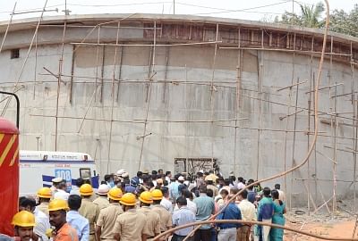 Bengaluru: Rescue operations underway after three workers were killed when a huge water tank under construction for a sewage treatment plant collapsed in the northern suburb of Bengaluru on June 17, 2019. The victims are reportedly from Bihar and West Bengal. (Photo: IANS)