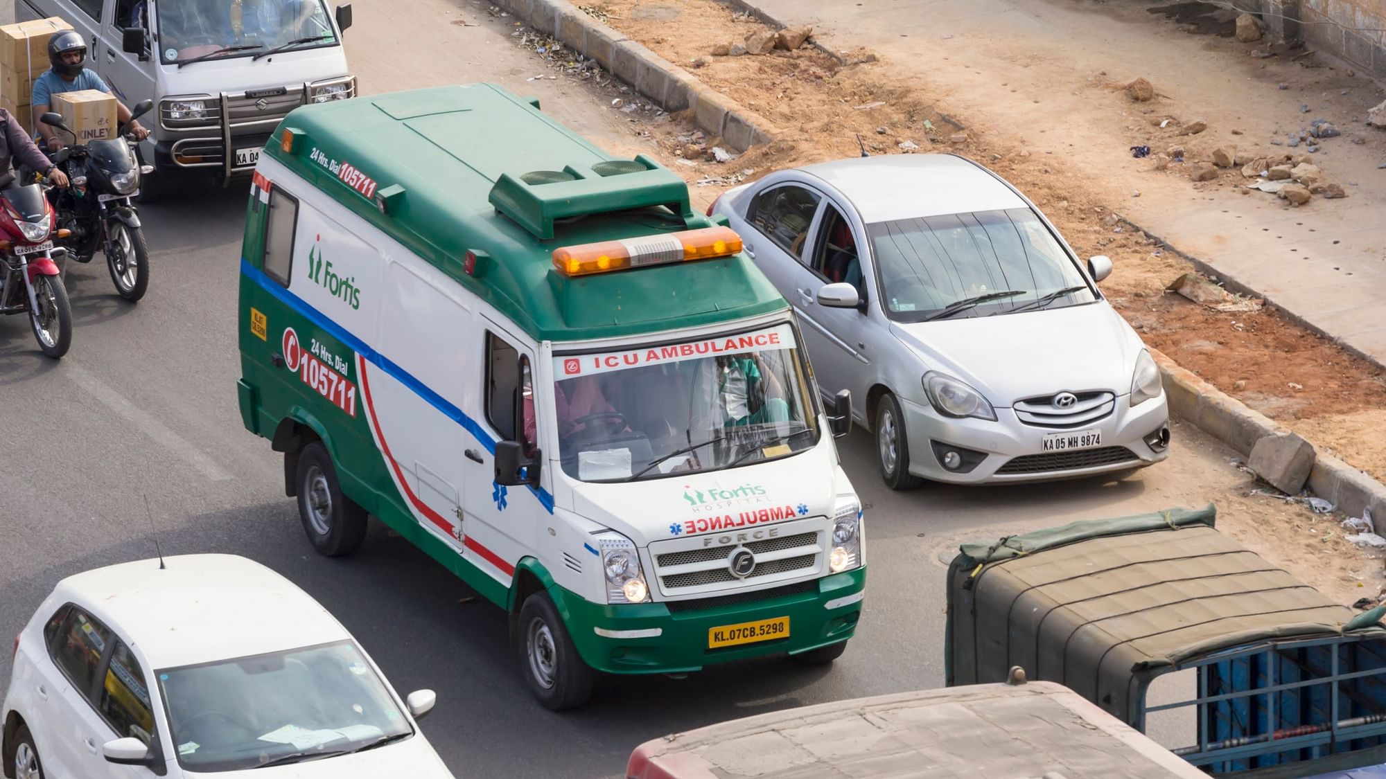 Bangalore, India: An ambulance belonging to a private hospital tries to make its way through traffic in south Bangalore, India.&nbsp;