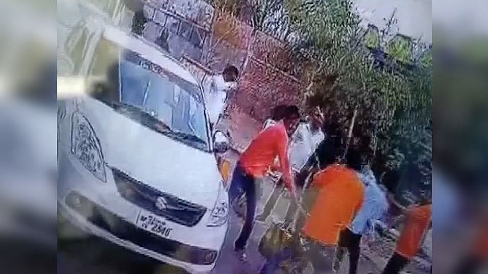 A screengrab from the CCTV footage of toll plaza employees beating up passengers.