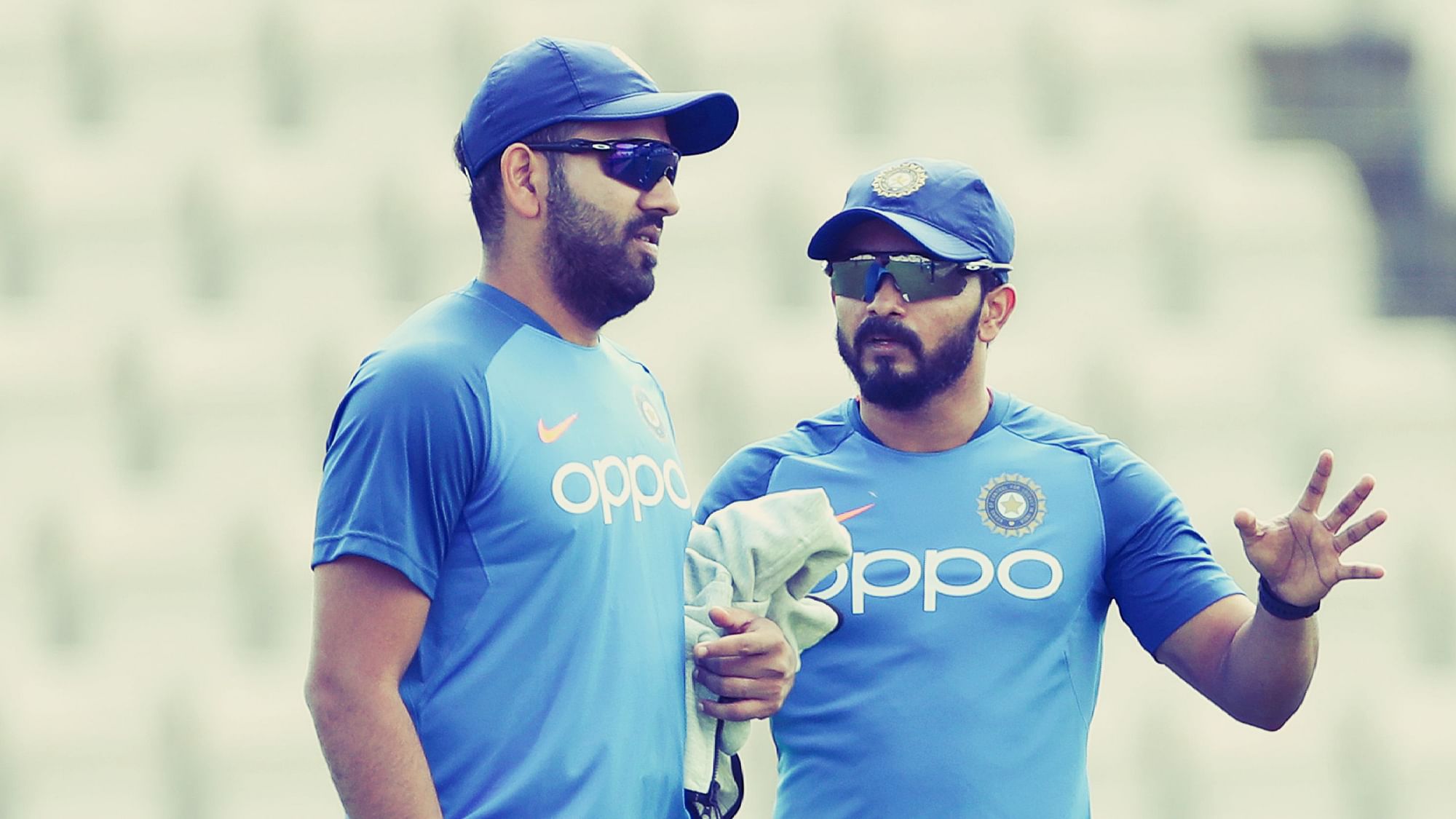 India’s Kedar Jadhav, right, interacts with teammate Rohit Sharma during a training session ahead of their Cricket World Cup match against South Africa.&nbsp;
