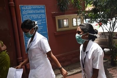 Ernakulam: Medical staff seen wearing masks at Ernakulam General Hospital. Kerala Health Minister K.K.Shailaja confirmed that the blood reports of a youth, suspected to be infected by the Nipah virus is positive on June 4, 2019. (Photo: IANS)