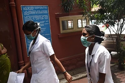Ernakulam: Medical staff seen wearing masks at Ernakulam General Hospital. Kerala Health Minister K.K.Shailaja confirmed that the blood reports of a youth, suspected to be infected by the Nipah virus is positive on June 4, 2019. (Photo: IANS)