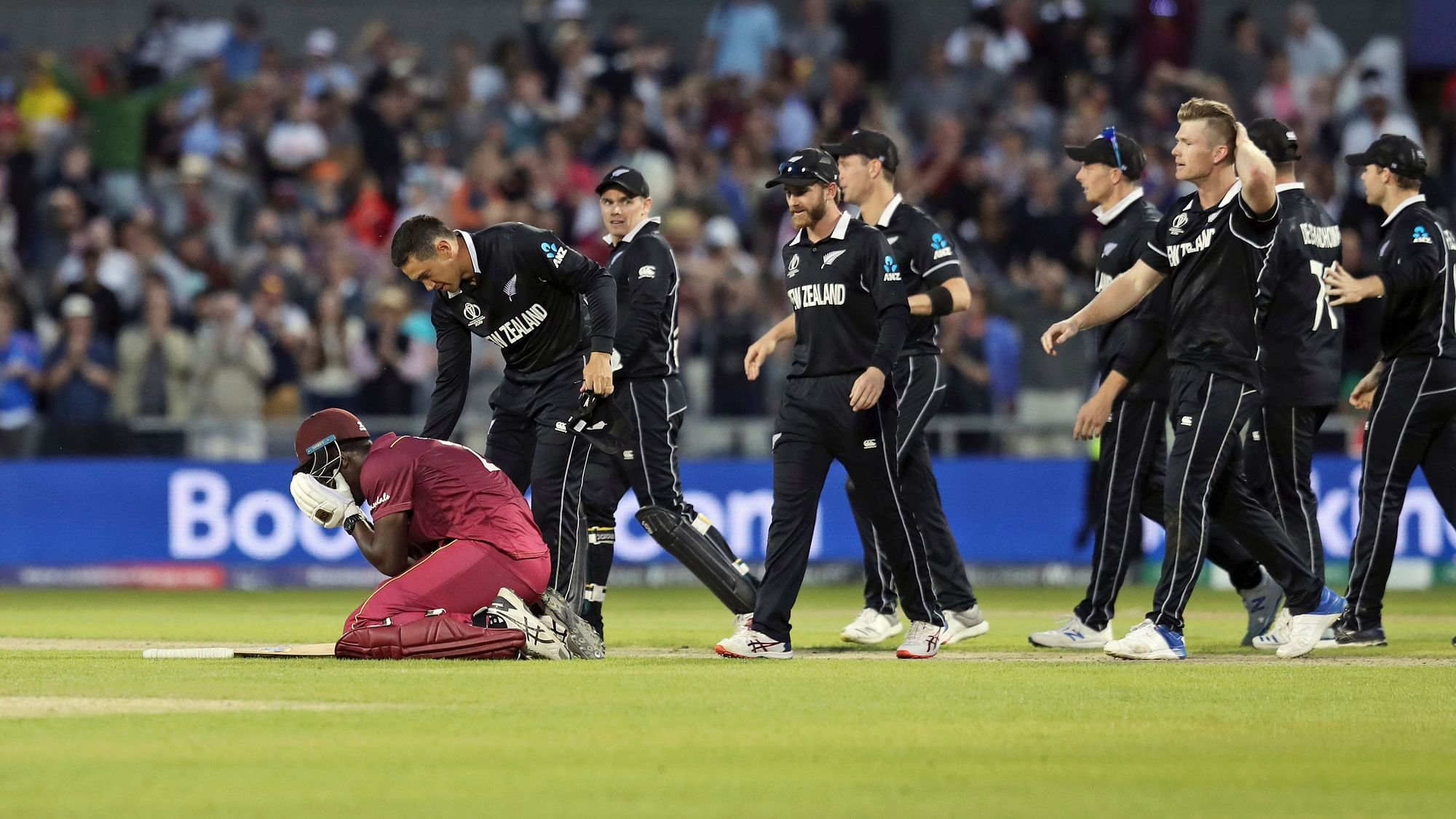 New Zealand’s Ross Taylor consoles West Indies’ Carlos Brathwaite at the end of the Cricket World Cup match between New Zealand and West Indies at Old Trafford.