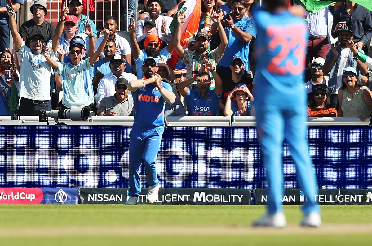 India’s Mohammed Shami takes a catch to dismiss West Indies’ Nicholas Pooran during the Cricket World Cup match between West Indies.