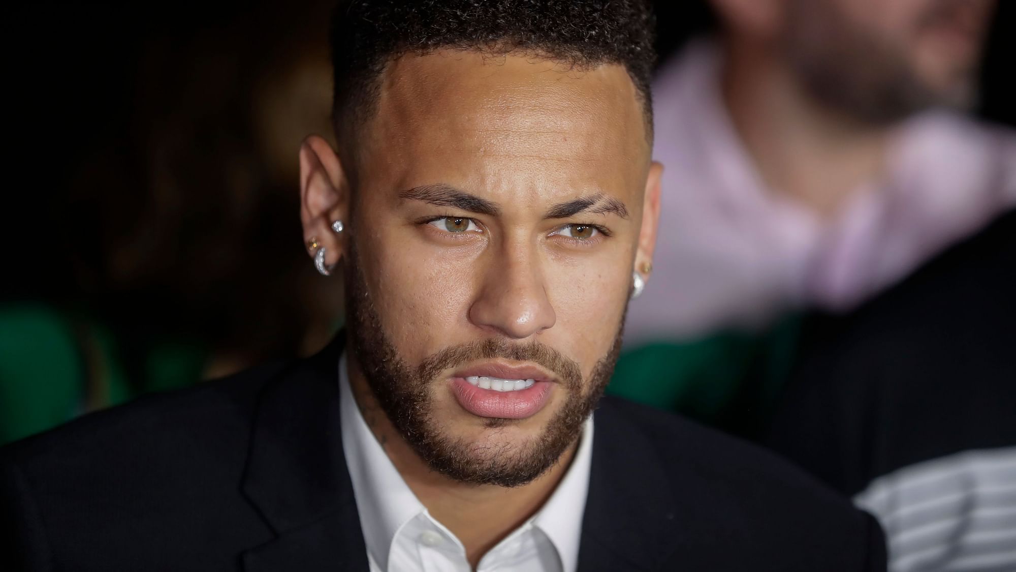 Neymar spoke to the press while leaving the police station where he was questions about the allegations on Thursday, 13 June 2019.