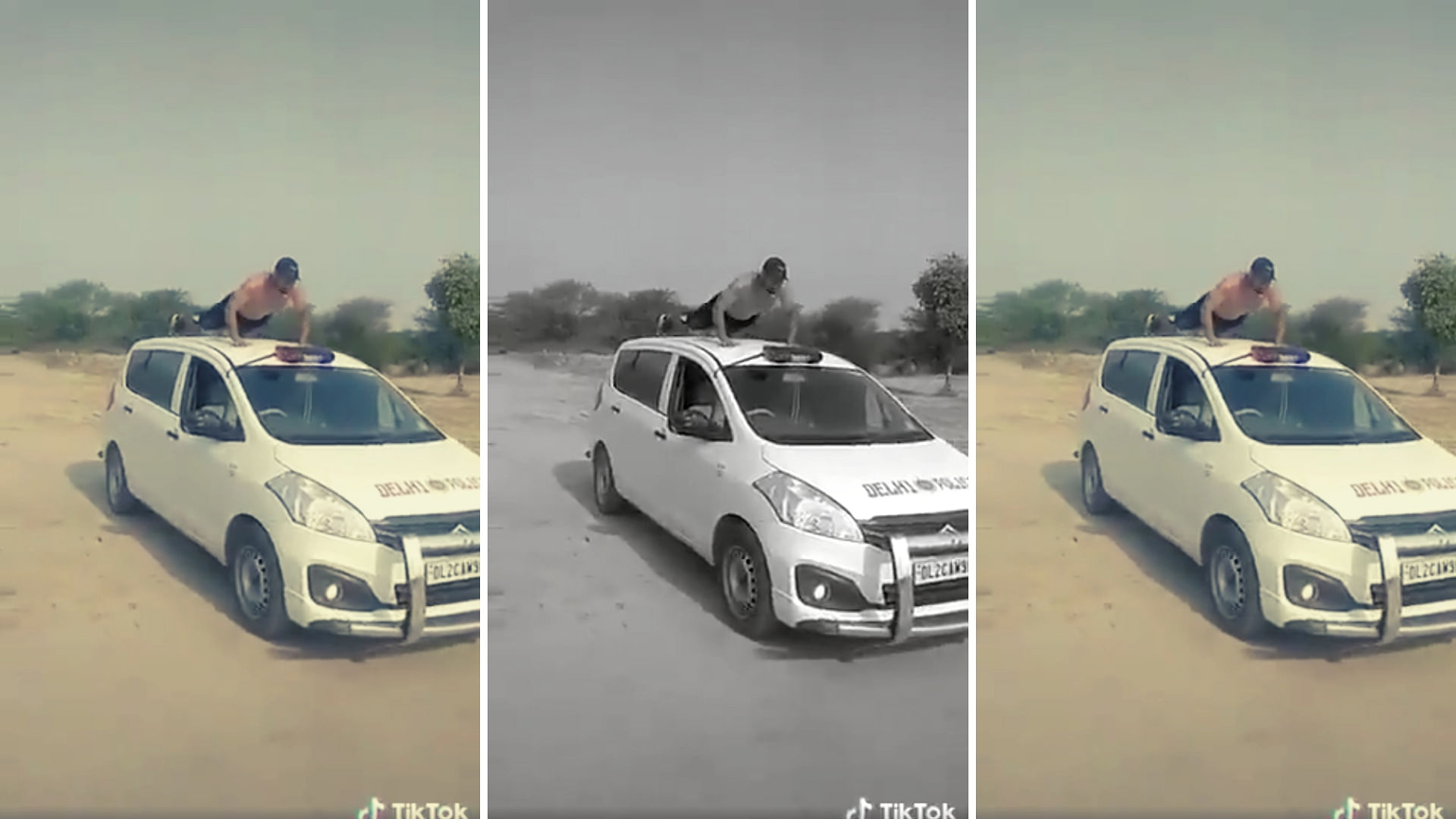 A still from the video of a man doing stunts on what appears to be a Delhi Police vehicle. The police has said that the vehicle is not owned by them.