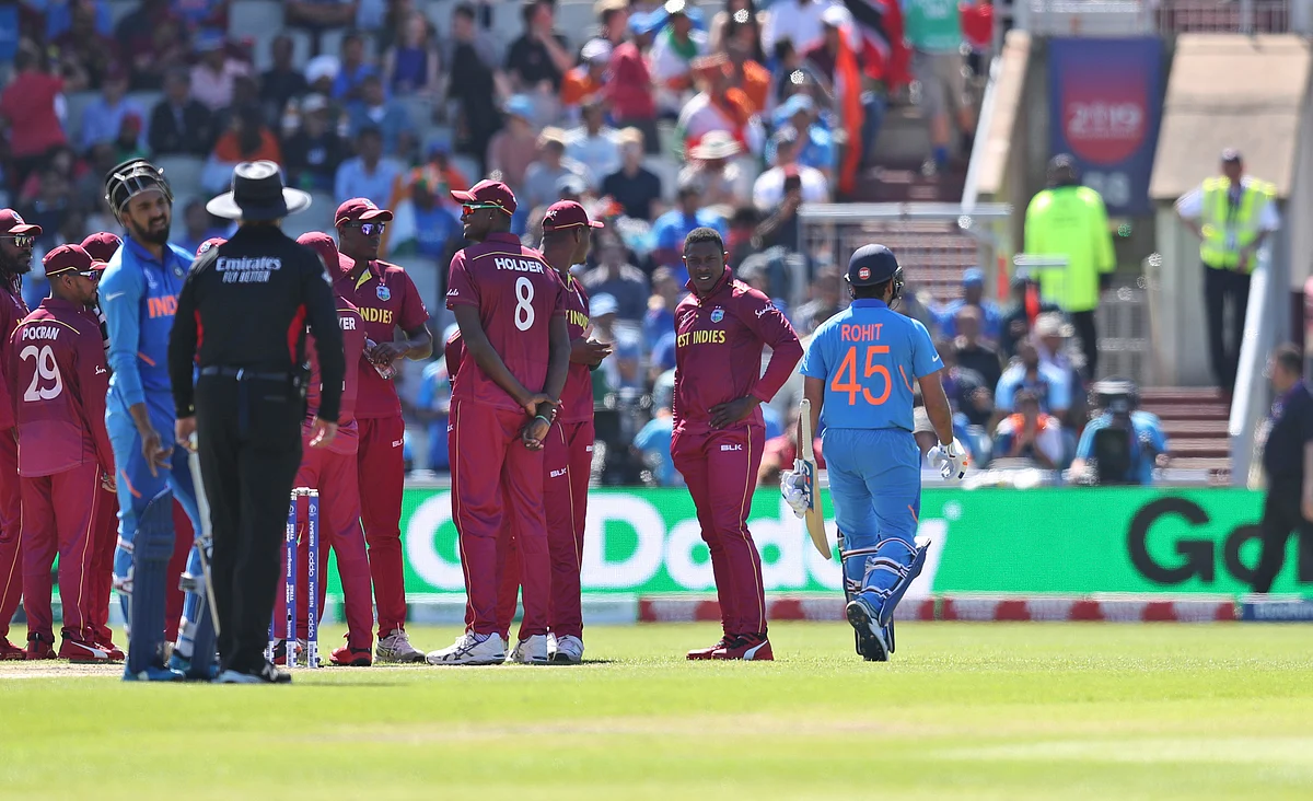India’s Rohit Sharma leaves the field after being dismissed during the Cricket World Cup match between India and West Indies at Old Trafford.