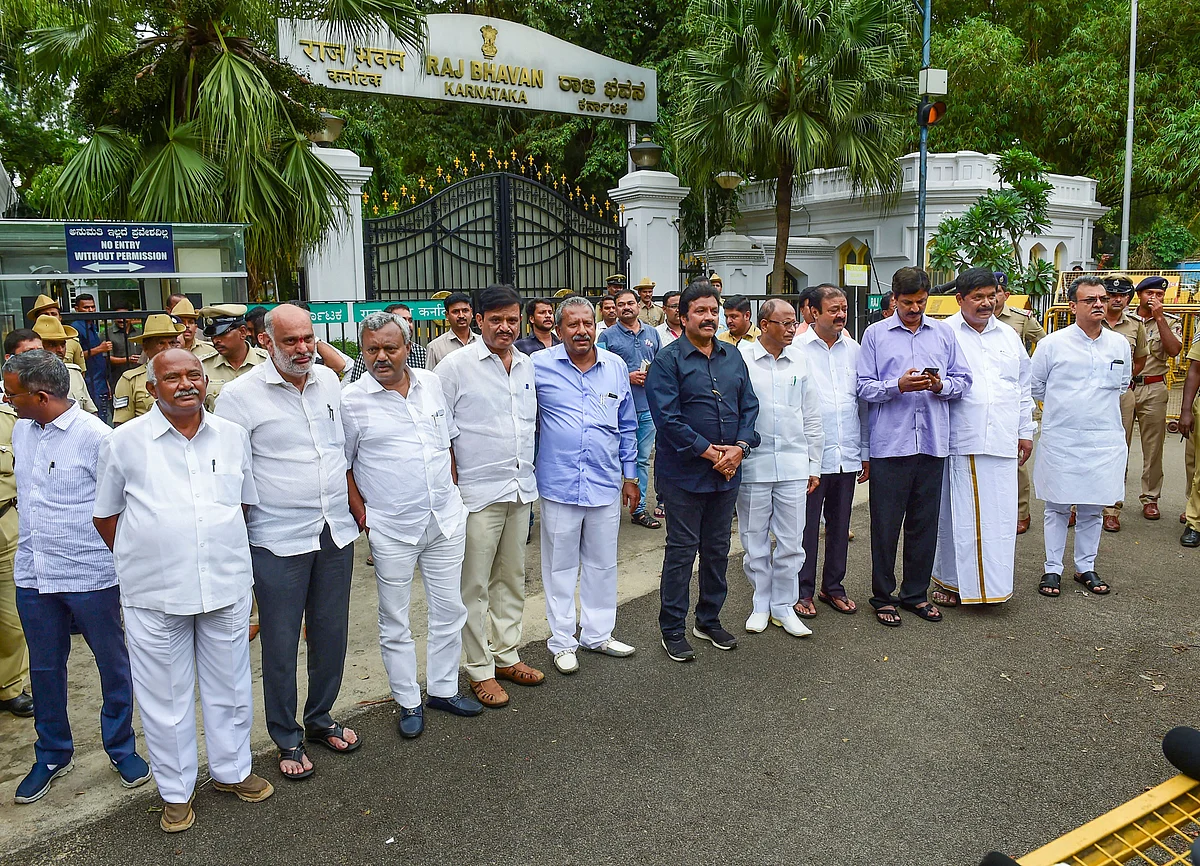 Dissident MLAs from JD(S) and Congress leave Raj Bhavan after meeting with Karnataka Governor Vajuibhai Vala, in Bengaluru.