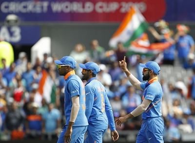 Manchester: Indian skipper Virat Kohli and Ravindra Jadeja celebrates fall of Ross Taylor