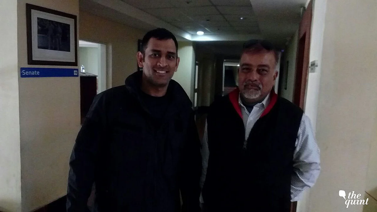 A recent photo of MS Dhoni with his coach Chanchal Bhattacharya.