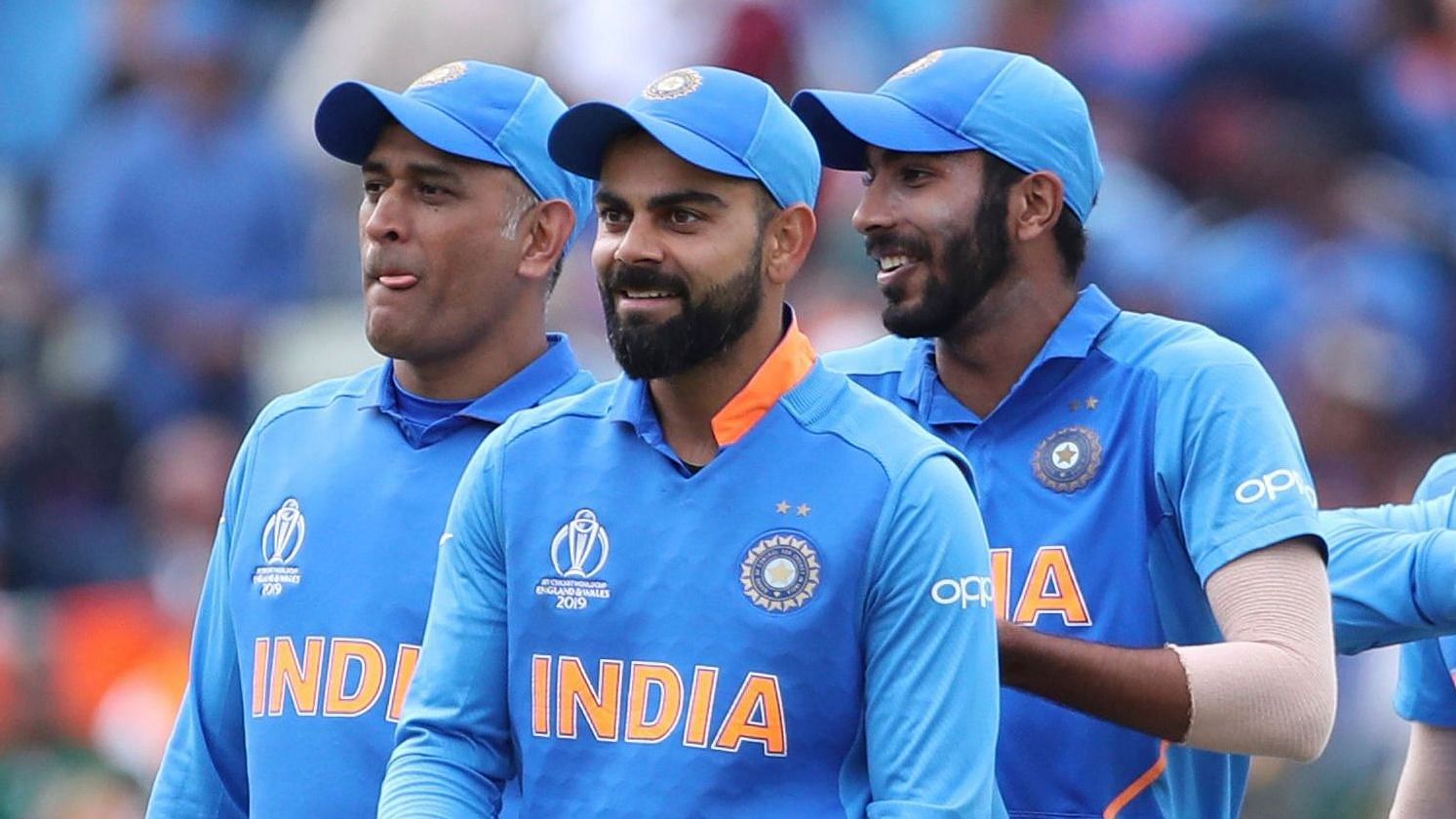 India’s captain Virat Kohli, second left, and teammates leave the field after their win over Bangladesh in the Cricket World Cup match at Edgbaston.