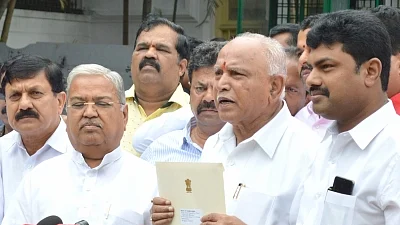 Bengaluru: Karnataka BJP President B. S. Yediyurappa talks to media personnel after meeting Governor Vajubhai Vala, in Bengaluru on July 26, 2019. 