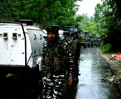 Shopian: Security personnel deployed at the site where a gunfight broke out between militants and security forces in Jammu and Kashmir