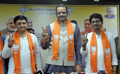 Gandhinagar: Former Congress legislators Alpesh Thakor and Dhavalsinh Zala join the BJP in presence of Gujarat BJP President Jitu Vaghani, in Gandhinagar, on July 18, 2019. (Photo: IANS)