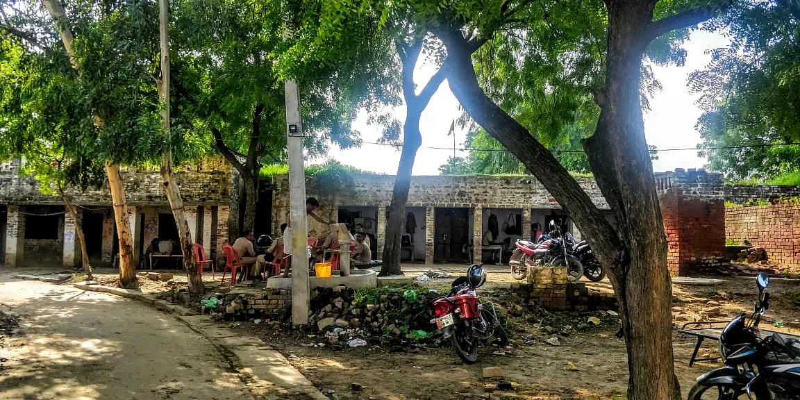 Security personnel outside the girl’s home in the village in Unnao.