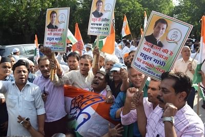 New Delhi: Congress workers assemble outside party President Rahul Gandhi
