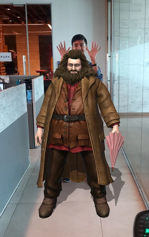 You can place Harry Potter characters like Hagrid in a real-world setting and take selfies with them. 