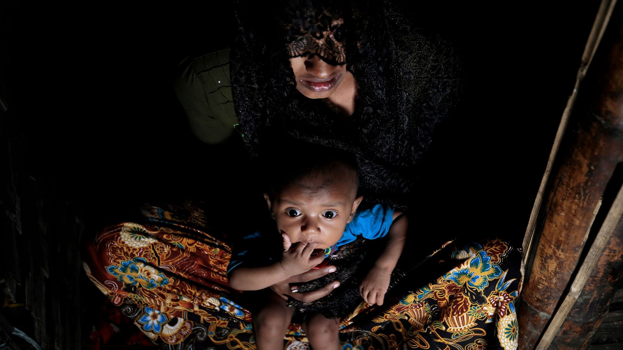 A Dec 2016 file photo of Mohsena Begum, a Rohingya who escaped to Bangladesh from Myanmar, holding her child at an unregistered refugee camp in Teknaf. Image used for representational purposes.