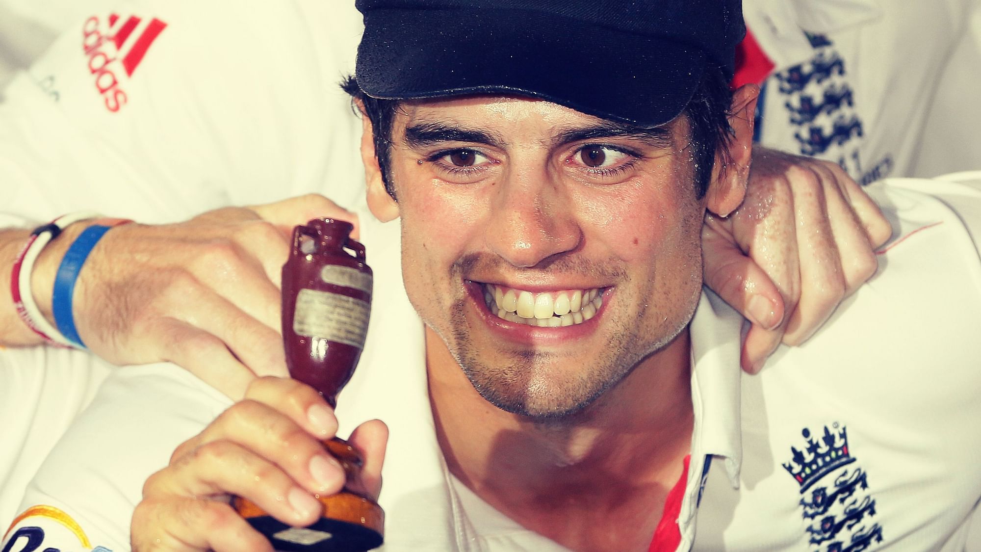 File photo England’s captain Alastair Cook as he holds up the Ashes Urn after the 2013 Ashes.