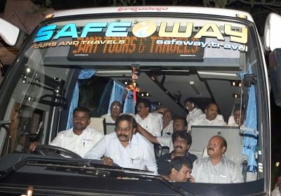 Bengaluru: JD(S) MLAs leaving in a bus from Hotel Taj West End to a resort in Kodagu following the political developments in Karnataka, in Bengaluru on July 8, 2019. (Photo: IANS)
