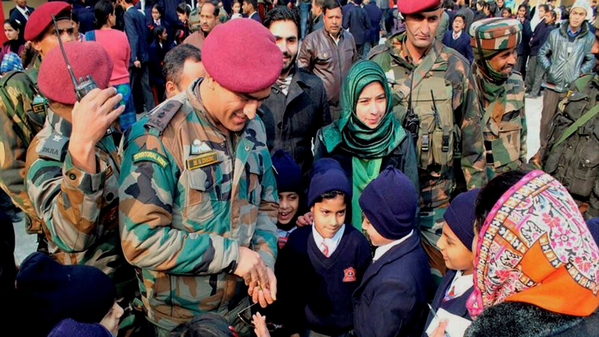 File picture of MS Dhoni interacting with the students of the Army public school during his surprise visit at a BB Cant in Srinagar in 2017.