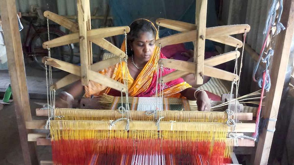Madur artisans, most of whom are women, use a loom or a bamboo frame to weave the mats.