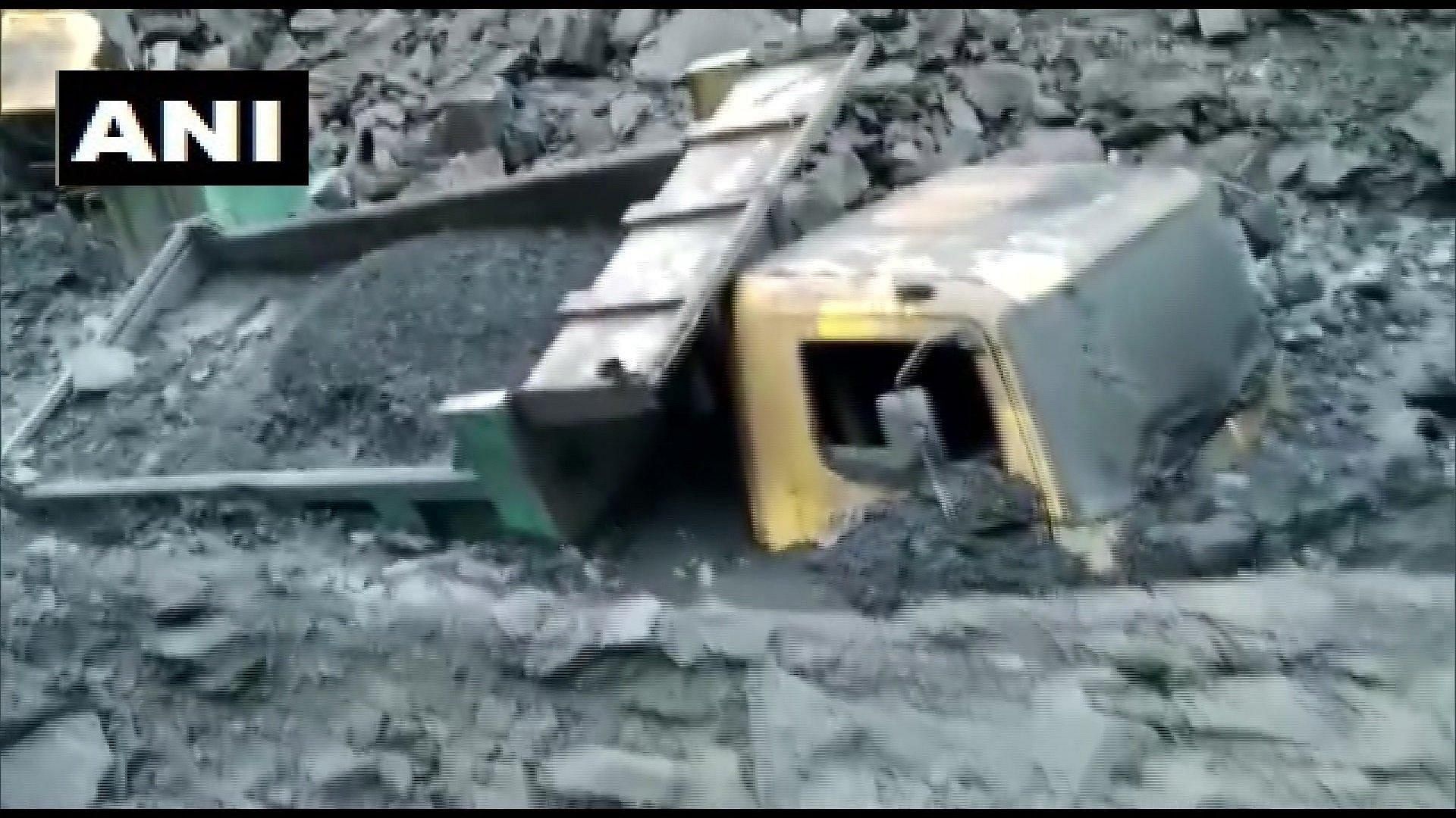 Nine coal miners were injured and four feared trapped after a dump slide at an opencast mine in Talcher coalfields.