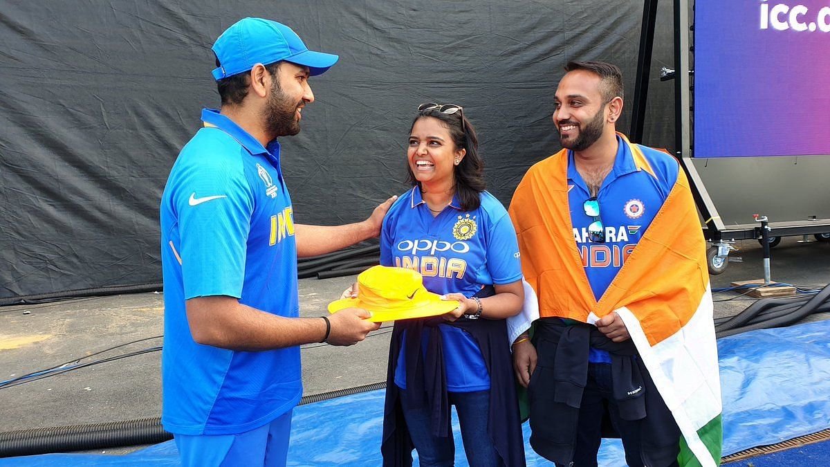 BCCI posted a picture of Rohit Sharma handing over the autographed hat to the fan who got hit by his six.