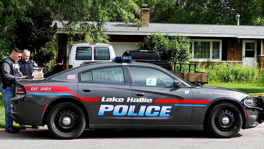 Lake Hallie Police work outside a home on 29 July 2019, in Lake Hallie, following a shooting the night before.&nbsp;