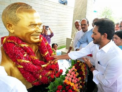 Kadapa:Andhra Pradesh Chief Minister Y.S. Jagan Mohan Reddy pays tributes to his father Y. S. Rajasekhara Reddy on his 70th birth anniversary, at his memorial at Idupulapaya in Kadapa district of Andhra Pradesh on July 8, 2019. (Photo: IANS)