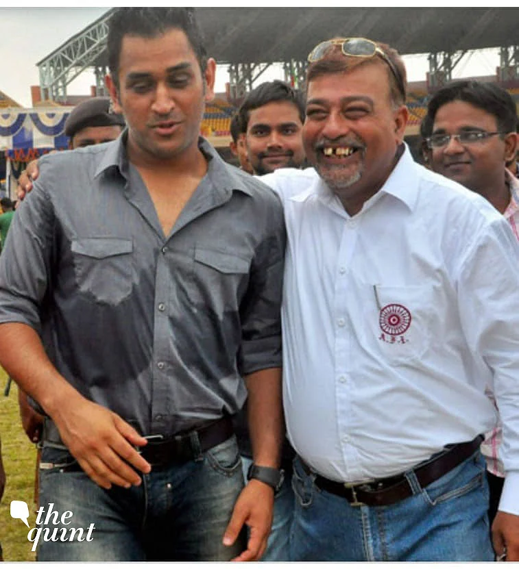 MS Dhoni with his coach Chanchal Bhattacharya.