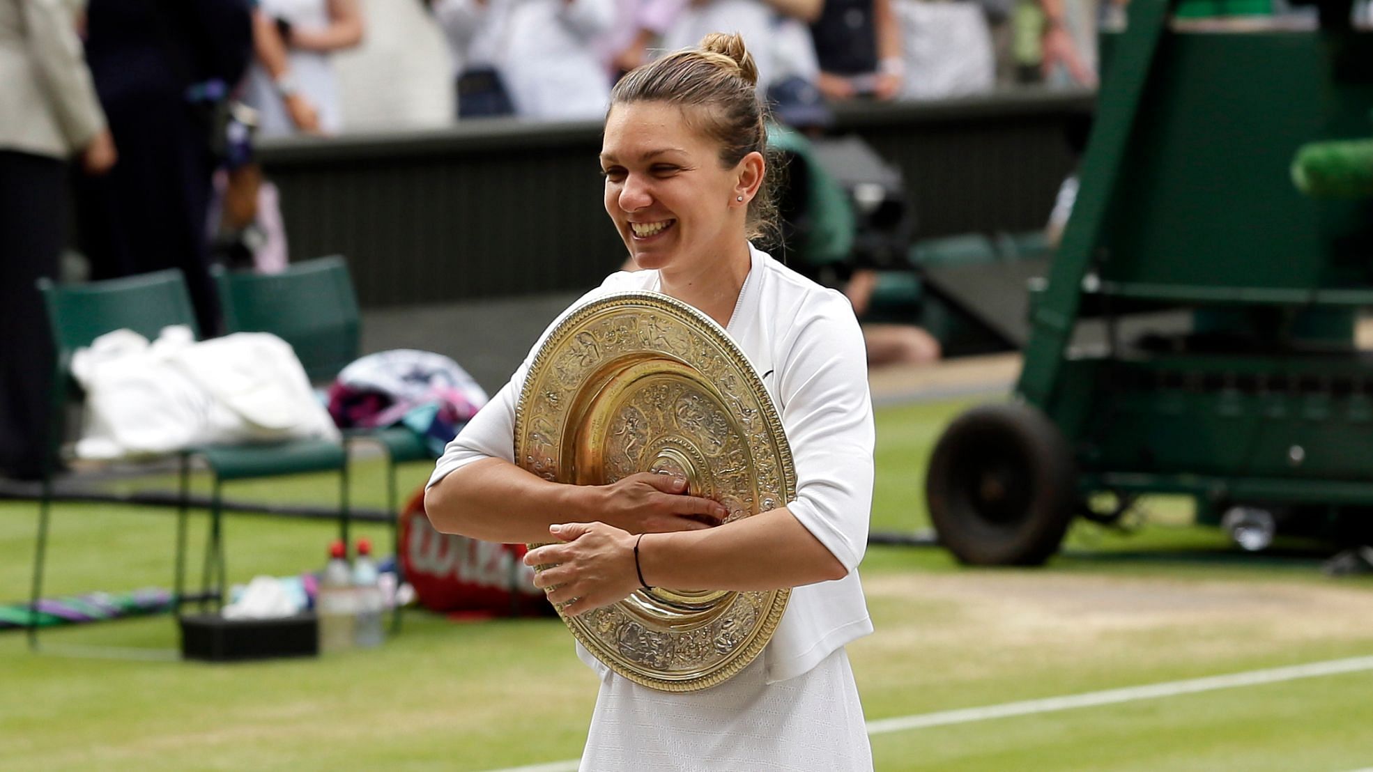 Seventh seed Simona Halep crushed eight-time winner Serena Williams in straight sets to win her maiden Wimbledon title