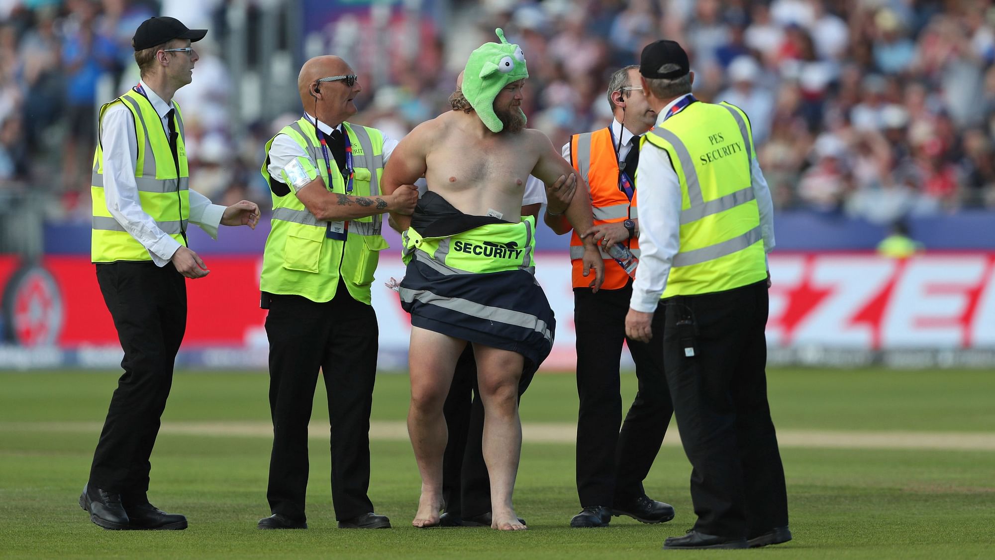 A streaker wearing nothing but a green hat ran onto the field and caused a delay in play in the Cricket World Cup match between England and New Zealand.