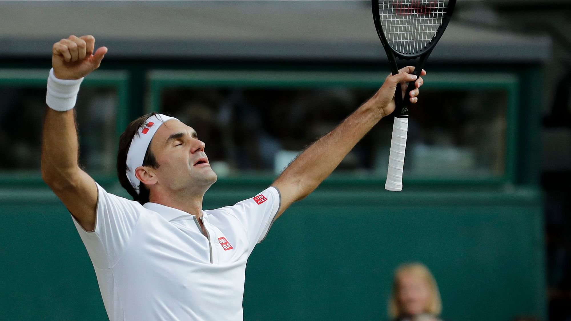 Roger Federer celebrates defeating Spain’s Rafael Nadal at 2019 Wimbledon.