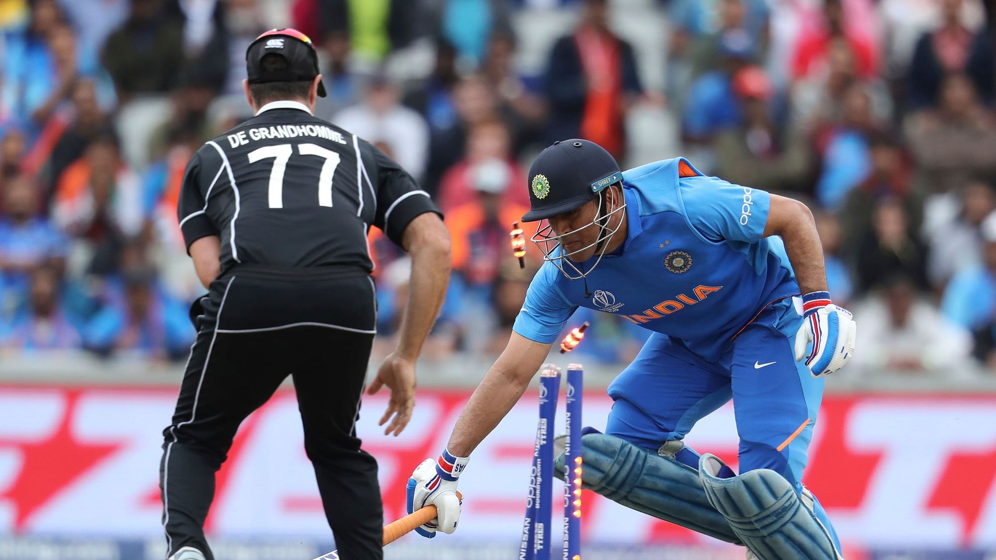 India’s Mahendra Singh Dhoni is run out during the Cricket World Cup semifinal match between India and New Zealand at Old Trafford.