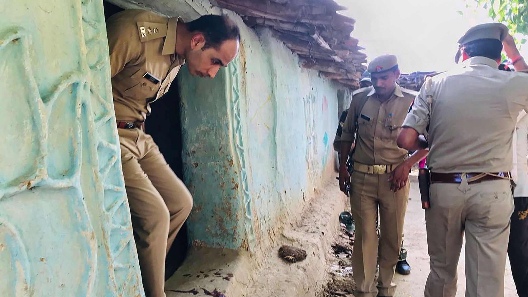S P Salman Taj Patil visits the house of a victim killed over a property dispute, in Sonbhadra district, Wednesday, July 17, 2019.