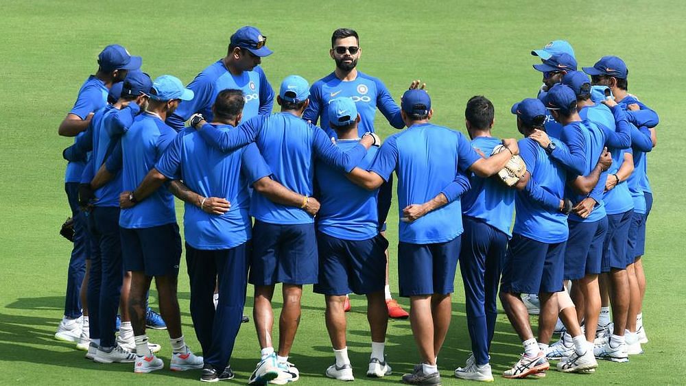 <div class="paragraphs"><p>Indian Cricket team discussing strategy.</p></div>