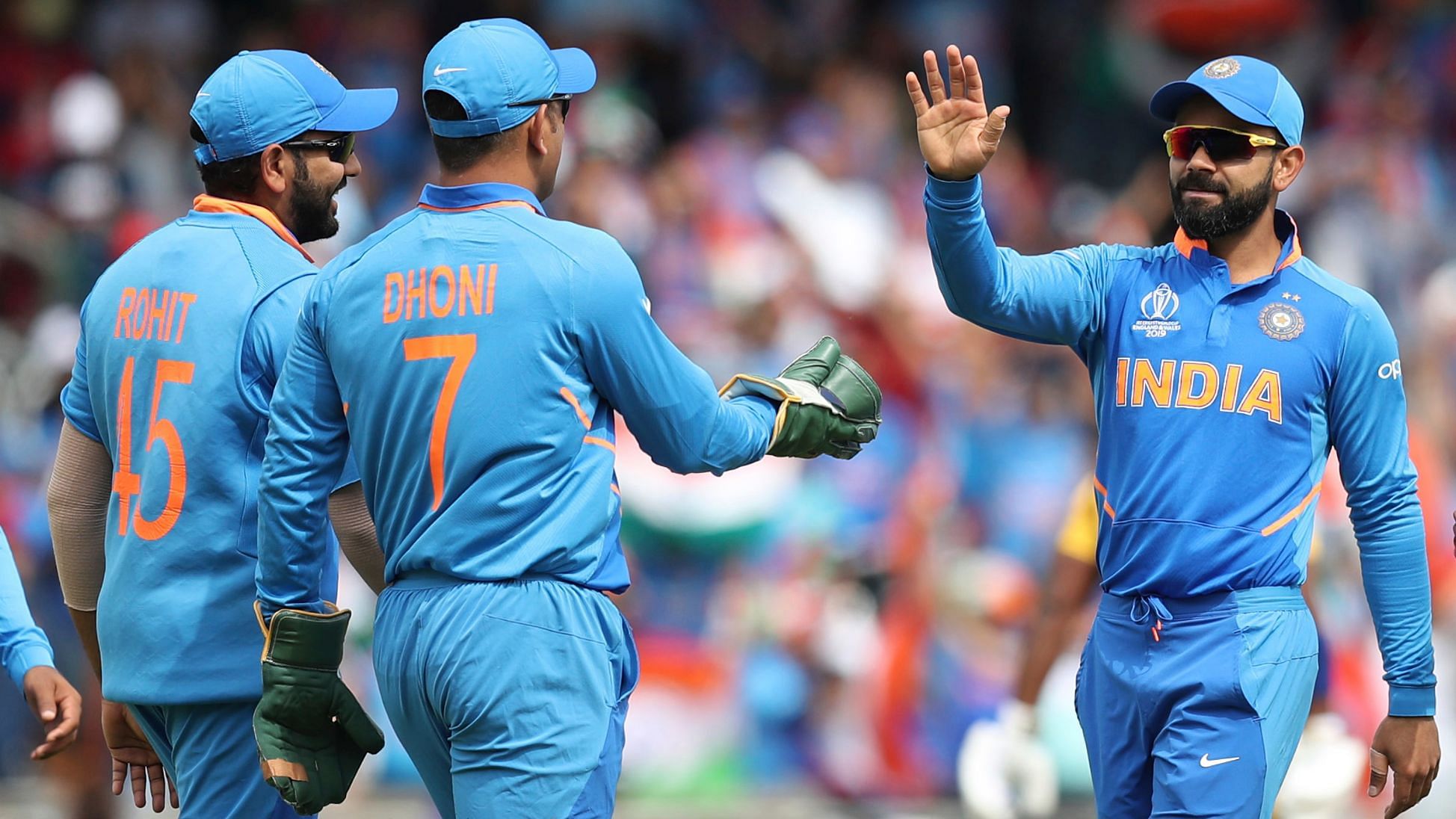 Indian cricketers celebrate the dismissal of Sri Lanka’s Kusal Perera, caught out by India’s Mahendra Singh Dhoni, center left, on Jasprit Bumrah’s, second right, bowling during the Cricket World Cup match.