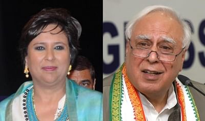 Barkha Dutt (Right) and Kapil Sibal (Left). (Photo: IANS)