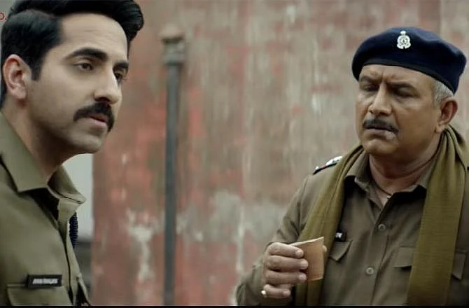 Ayushmann Khurrana and Kumud Mishra in the film ‘Article 15’.