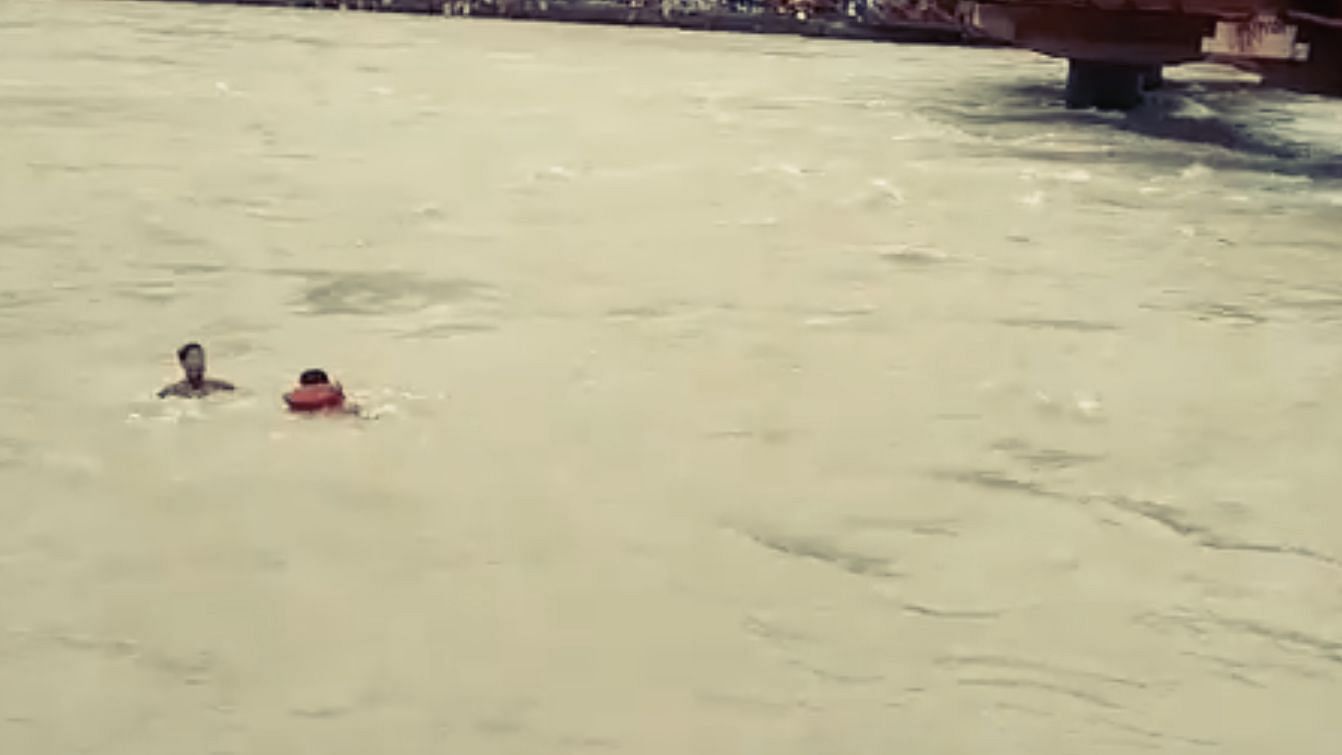 An Uttarakhand police officer has received praise after a viral video showed him risking his life to save a man from drowning in the Ganga.