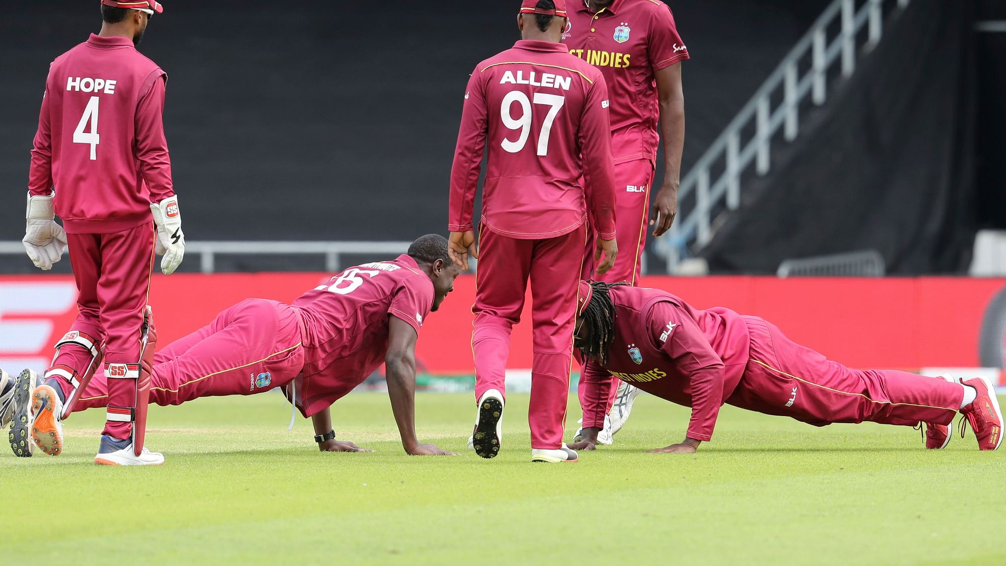West Indies players celebrate the dismissal of Afghanistan’s Rahmat Shah during the Cricket World Cup match between Afghanistan and West Indies at Headingley in Leeds, England, Thursday, July 4, 2019.&nbsp;