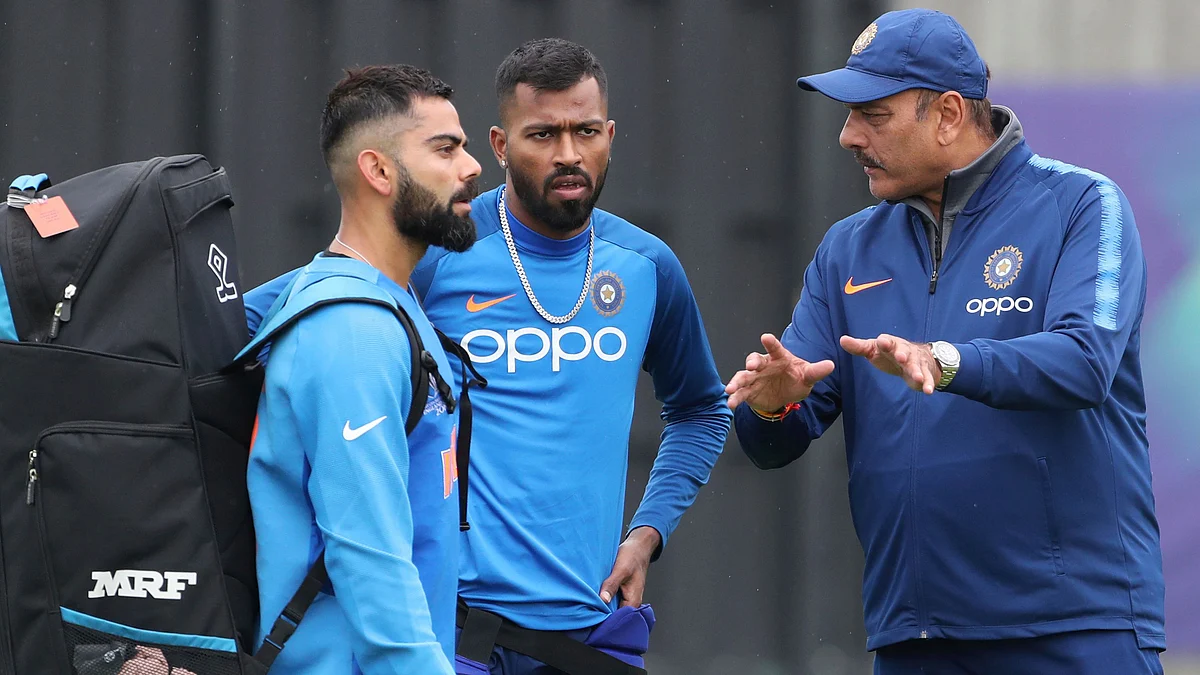 Ravi Shastri with Indian skipper Virat Kohli and Hardik Pandya during a training session of the 2019 ICC World Cup.