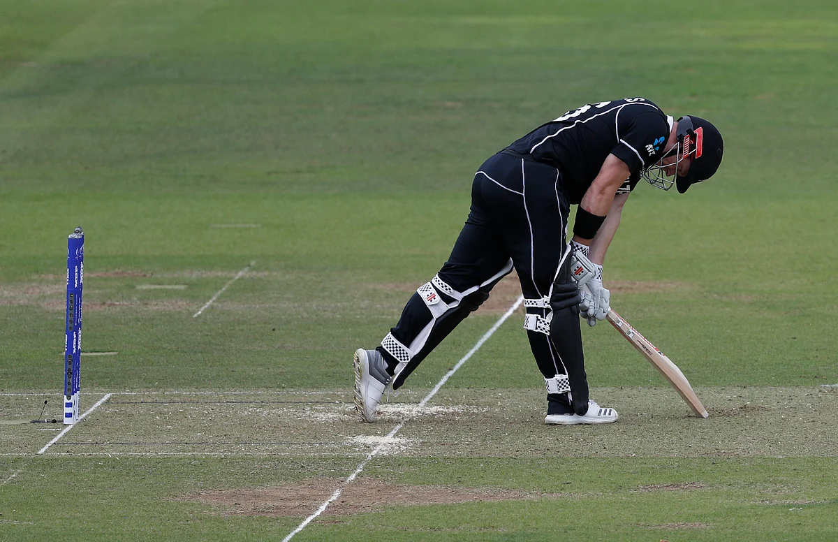 New Zealand’s Henry Nicholls reacts after being clean bowled by England’s Liam Plunkett during the Cricket World Cup final match between England and New Zealand.