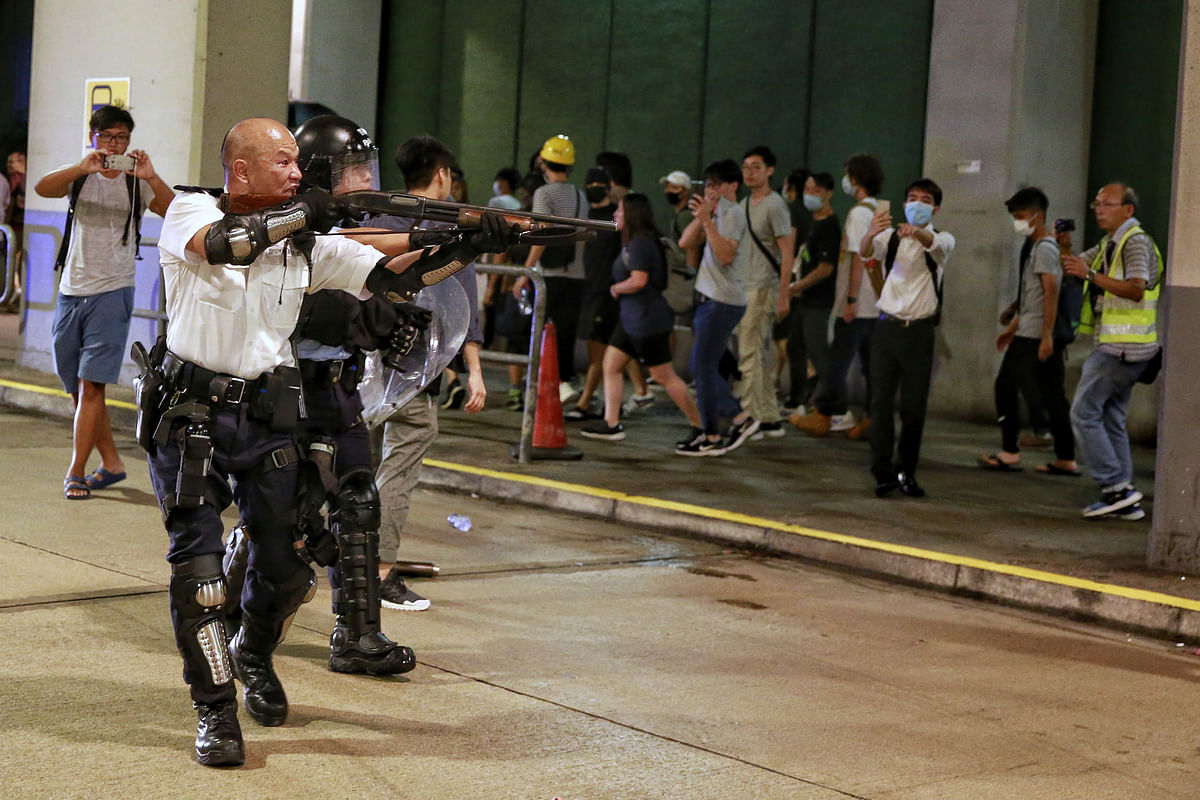 Hong Kong police said  that the protesters set up roadblocks, broke fences and attacked police officers.