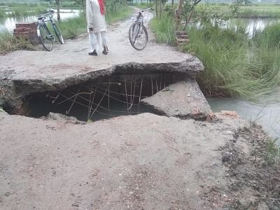 Motihari: A road damaged by floods in Motihari, Bihar on July 13, 2019. (Photo: IANS)