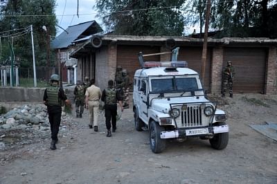 Anantnag: Security personnel conduct search operations after personal security guard of a National Conference leader Syed Tauqeer Ahmad in Hiller village of Jammu and Kashmir