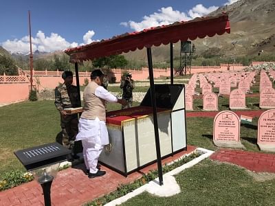 Dras: Defence Minister Rajnath Singh pays tributes to the martyrs at Kargil War Memorial in Dras of Jammu and Kashmir