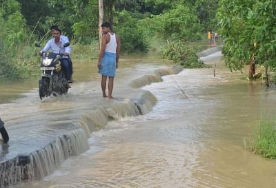 Muzaffarpur: A road destroyed by flood water in Katra block of Muzaffarpur on July 15, 2019. (Photo: IANS)